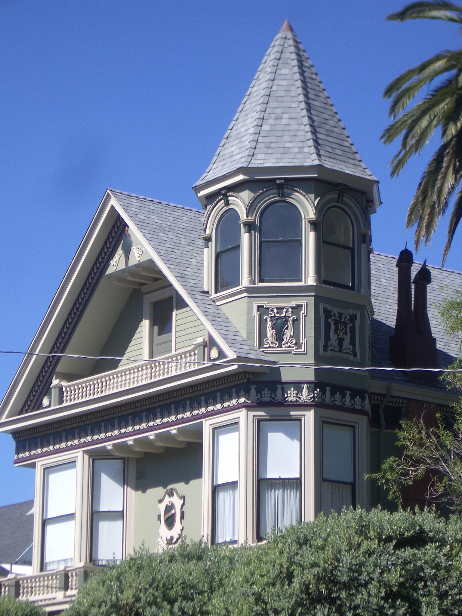 a big house with a tower near the top