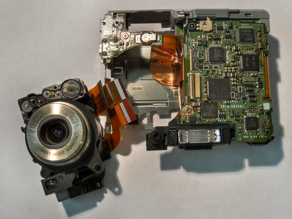 a camera being used to repair a broken electronic device