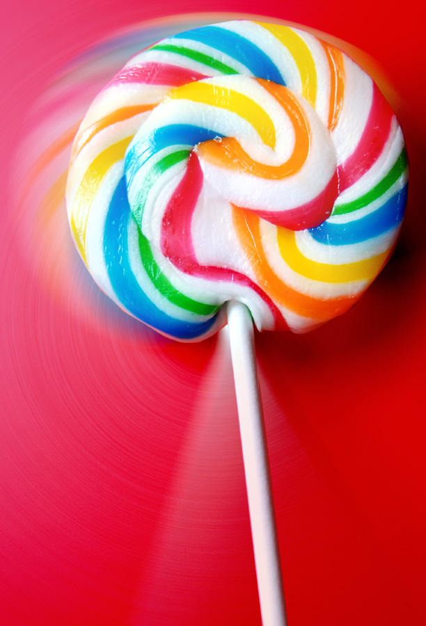 a colorful lollipop pops with a long round design
