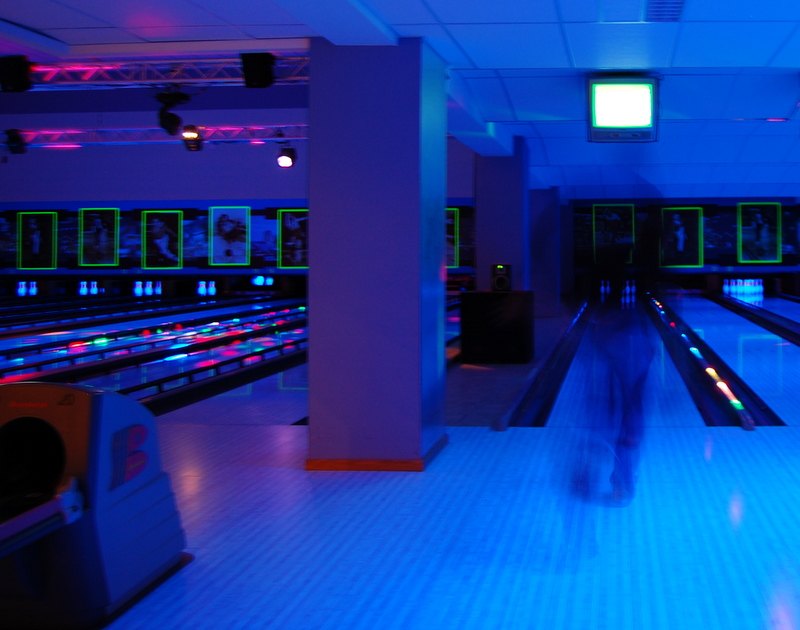 bowling alley with lots of lanes in the background
