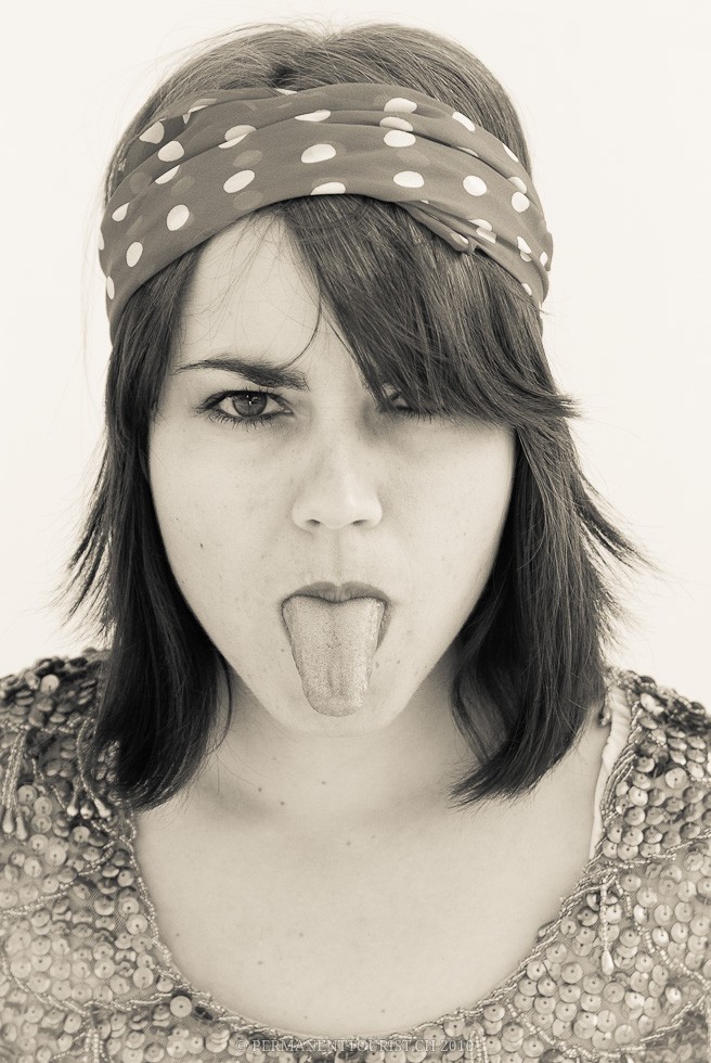 a person making a silly face with her tongue