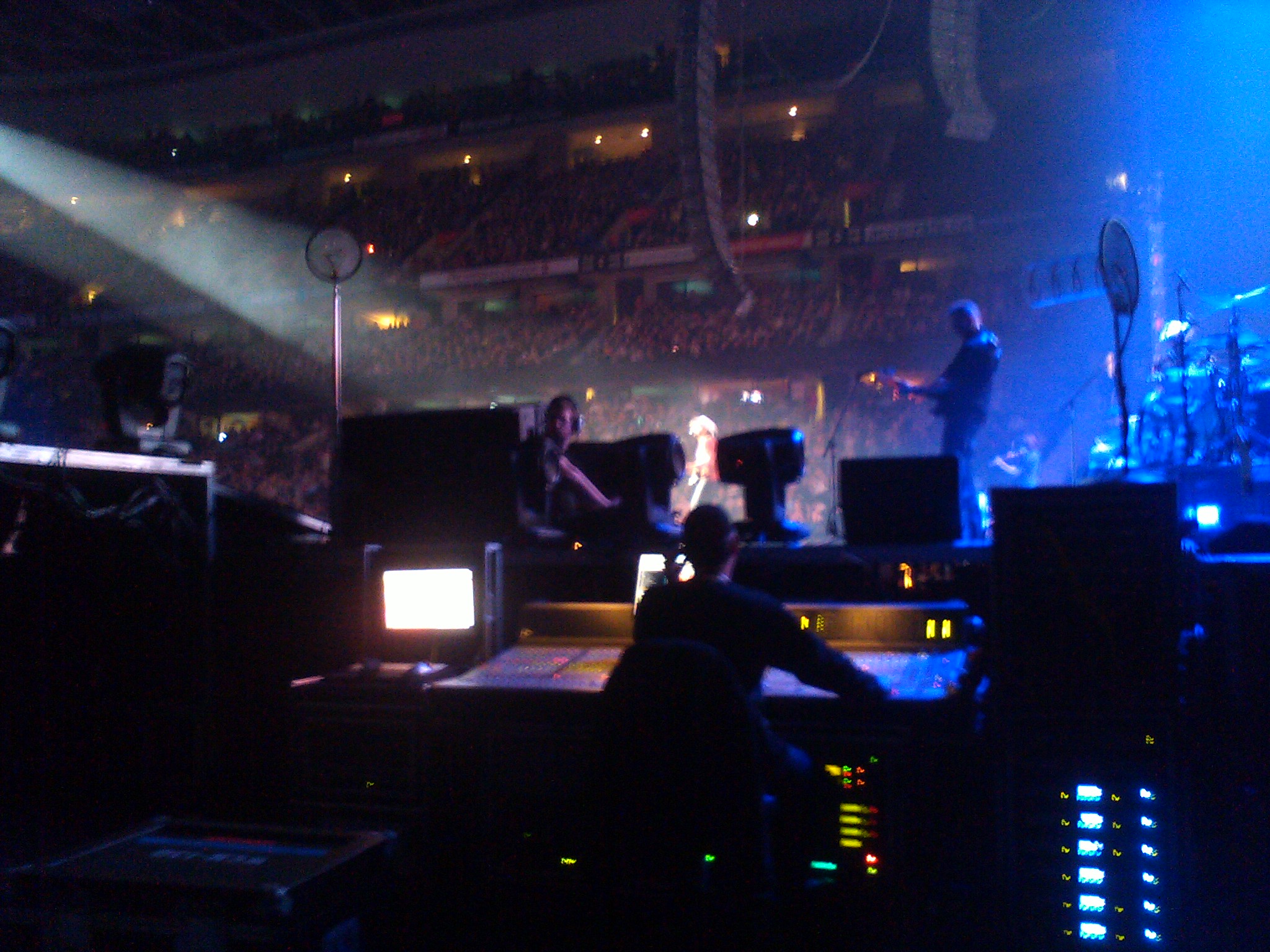 a stage set for a concert with lots of people