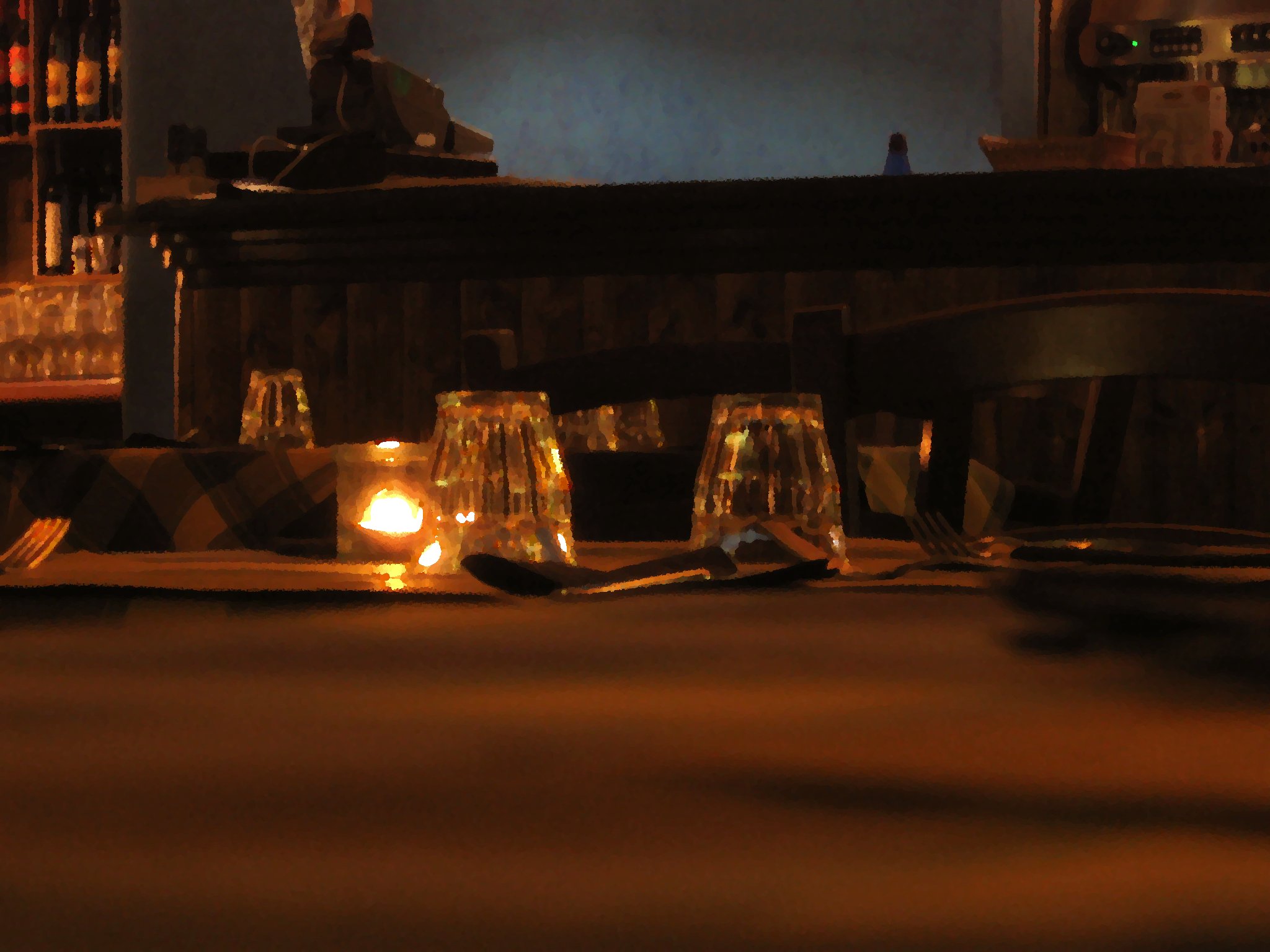 a number of dishes and utensils sitting on a dining table