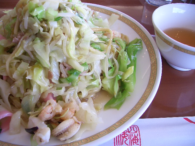 this plate of food includes noodles, broccoli and sauce