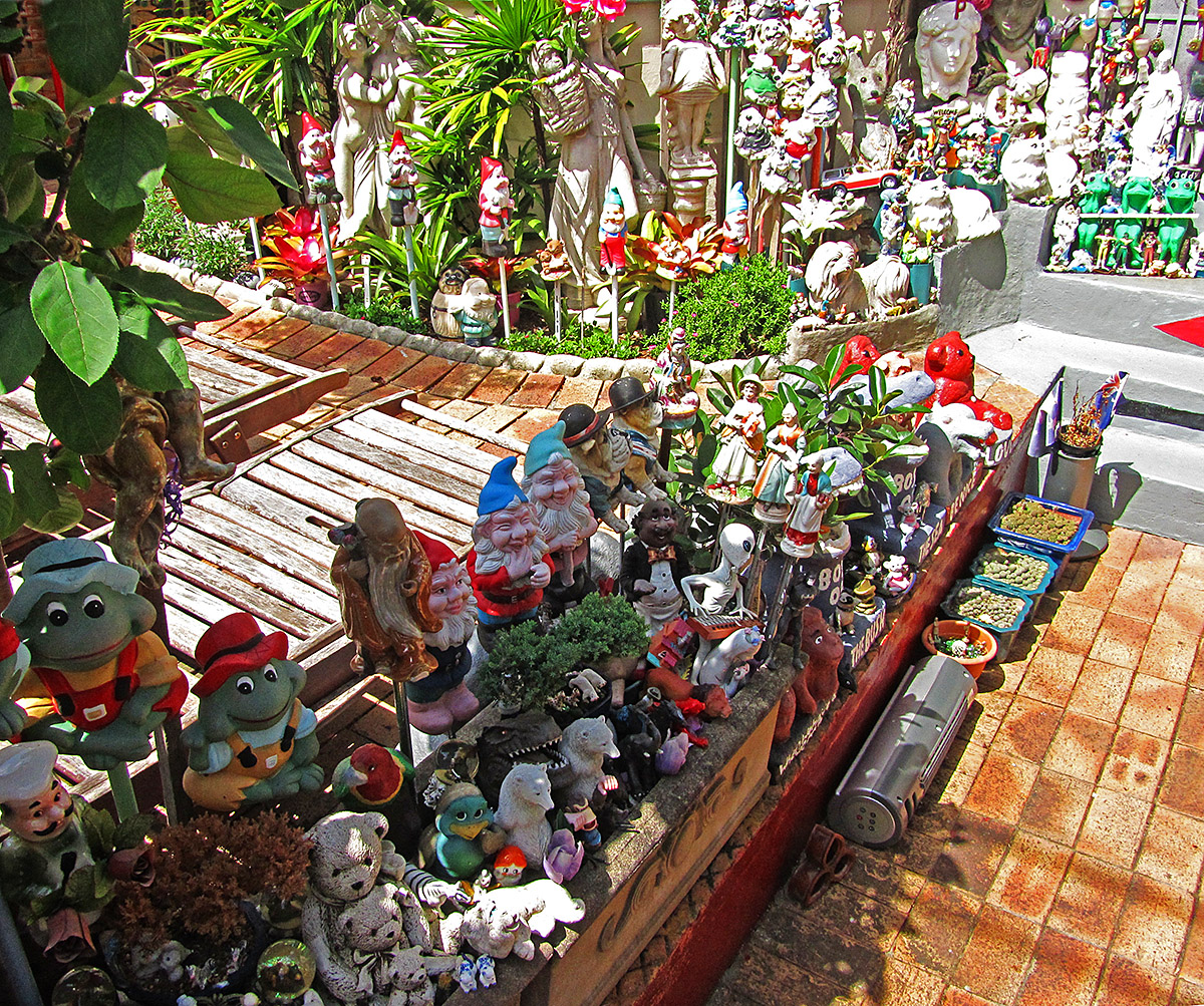 a small window display filled with different kinds of items