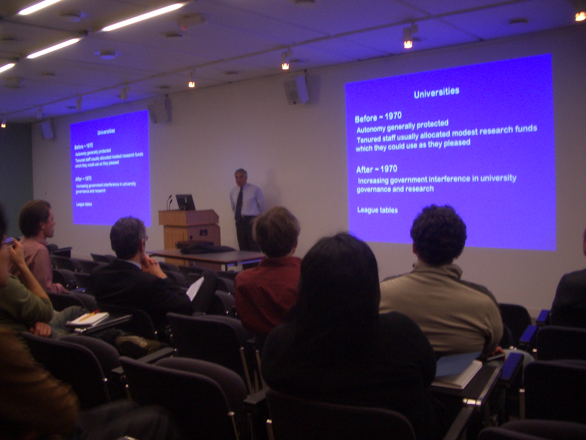 people at a public lecture about computer science