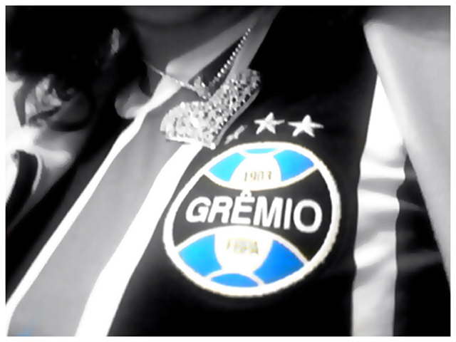 the badge for a group of people with the name gremo on it