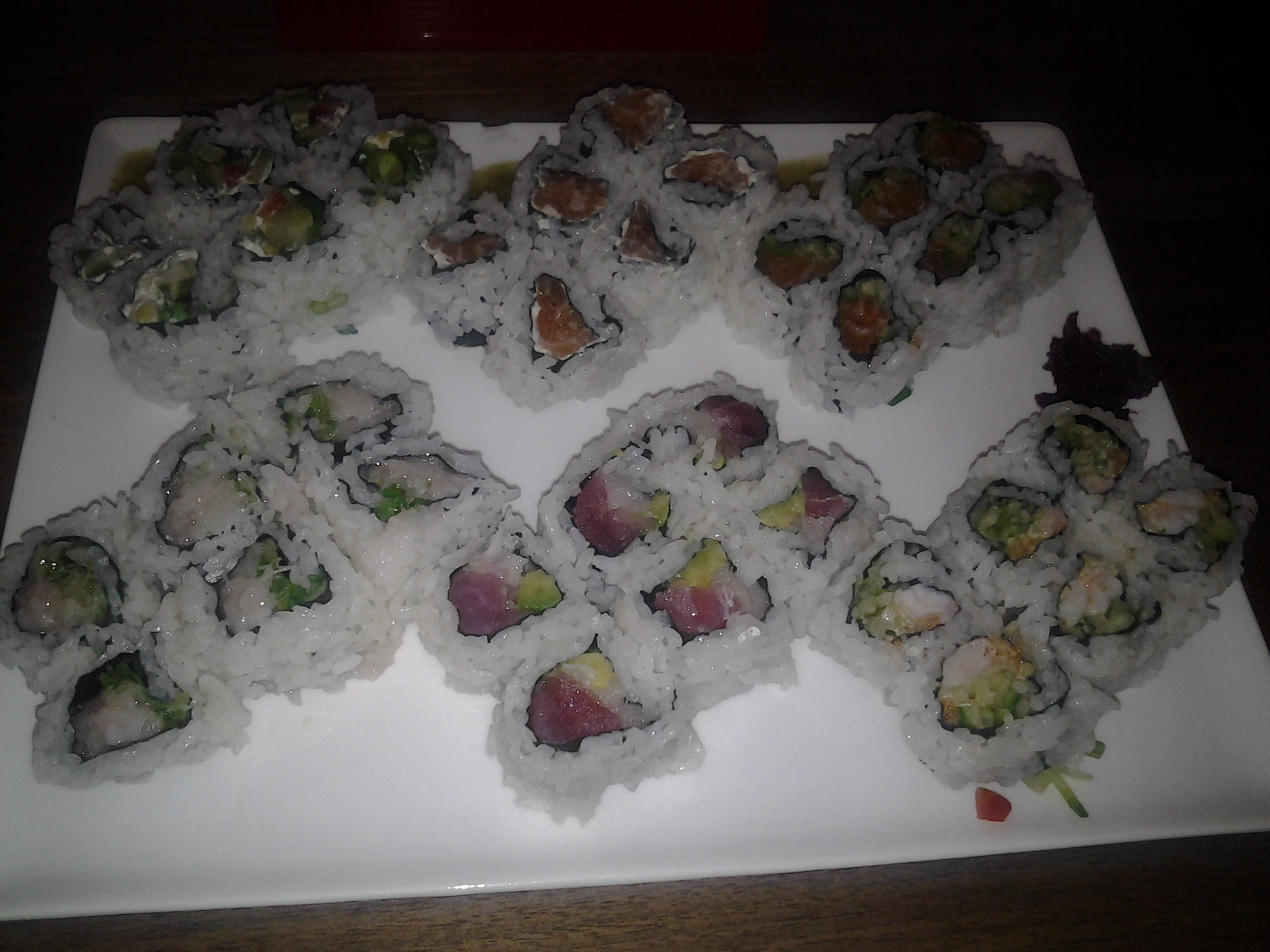 several sushi rolls are on the plate