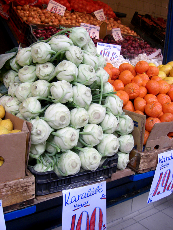 fruits and vegetables on display at a market