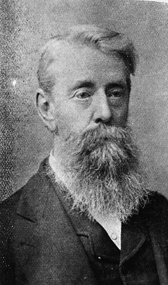 an old black and white pograph of a man with a beard