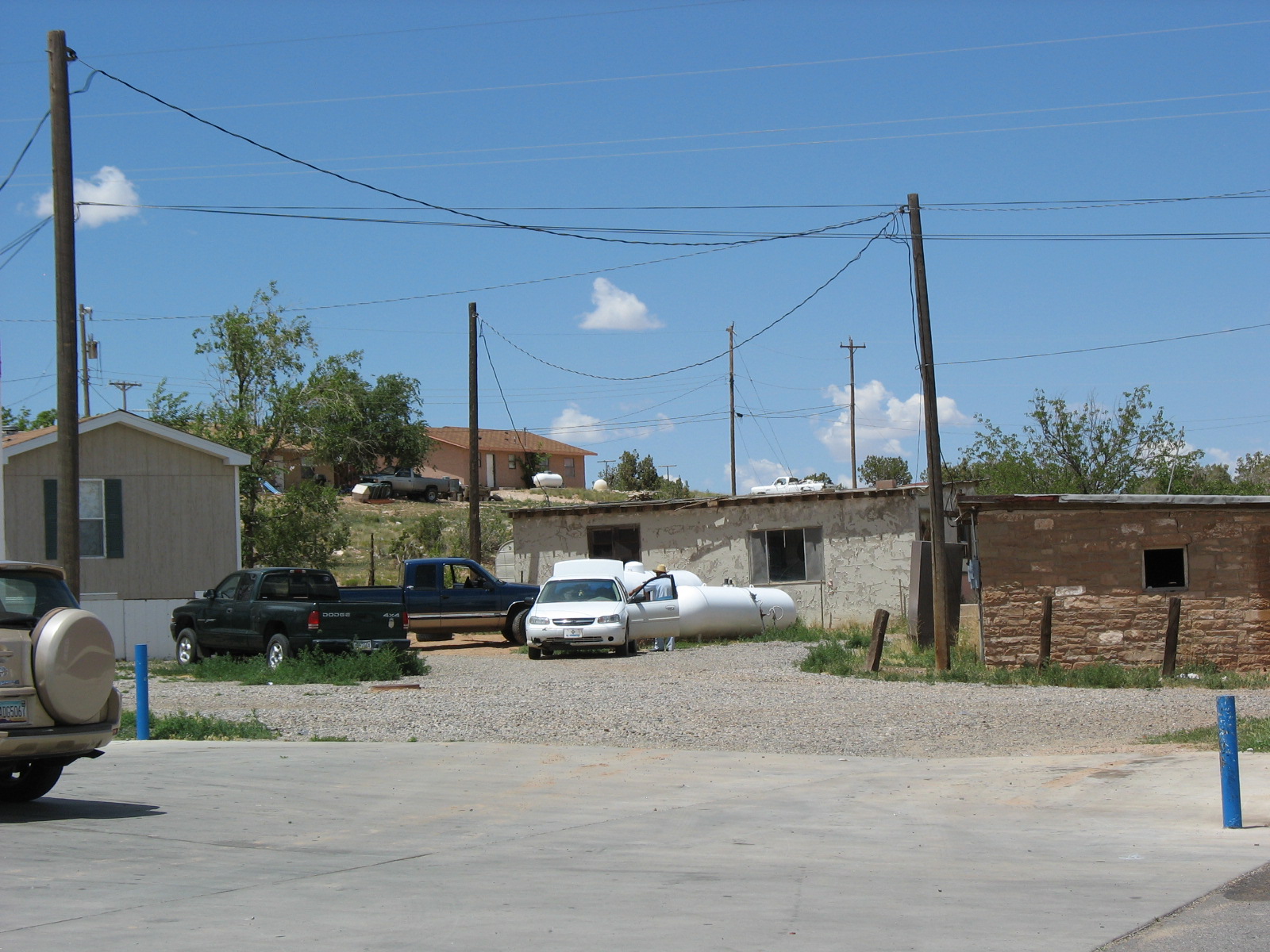 two trucks parked outside near each other