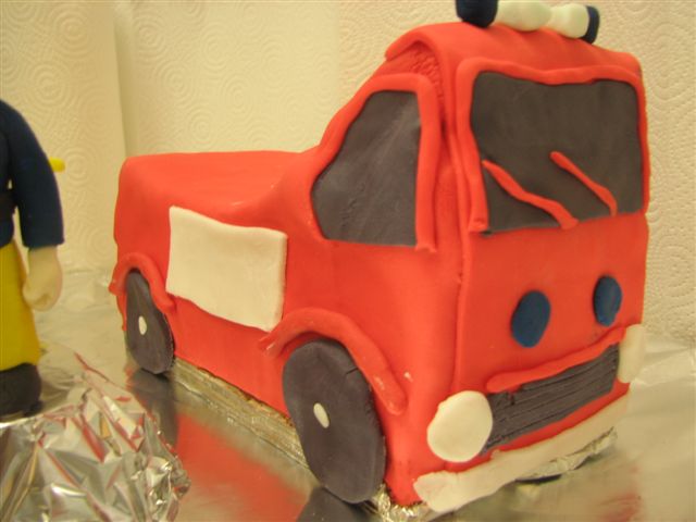 the birthday cake looks like a fire truck