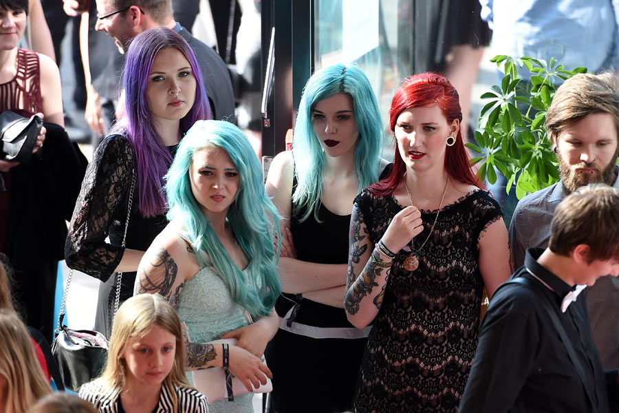 there is a large group of girls with hair dyed blue