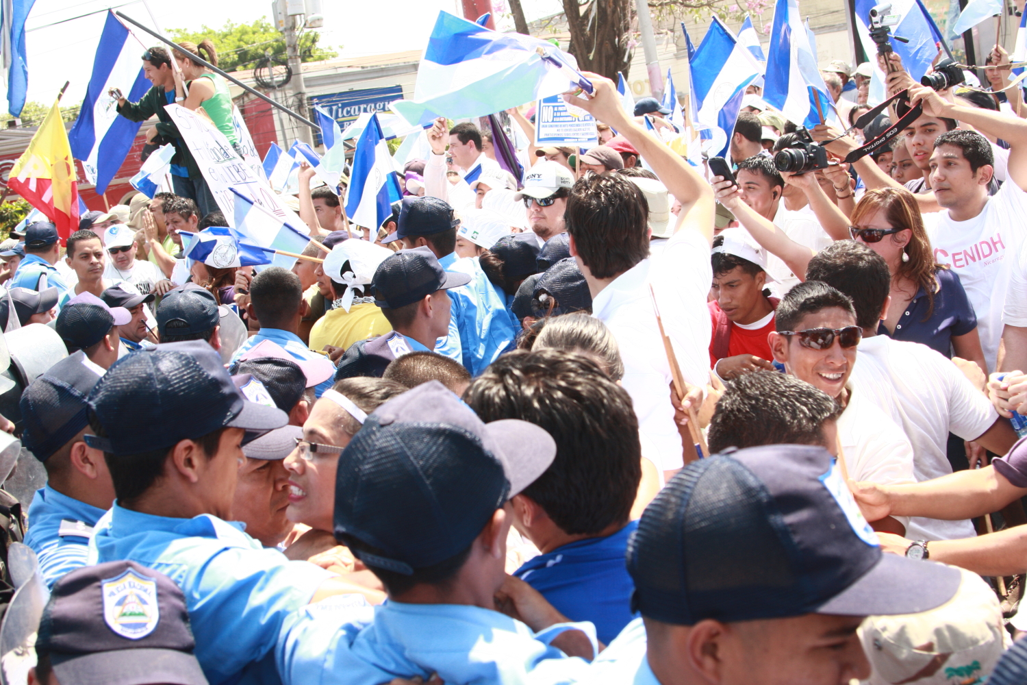 a large group of people with many flags
