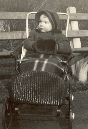 an old po of a small child on a wagon