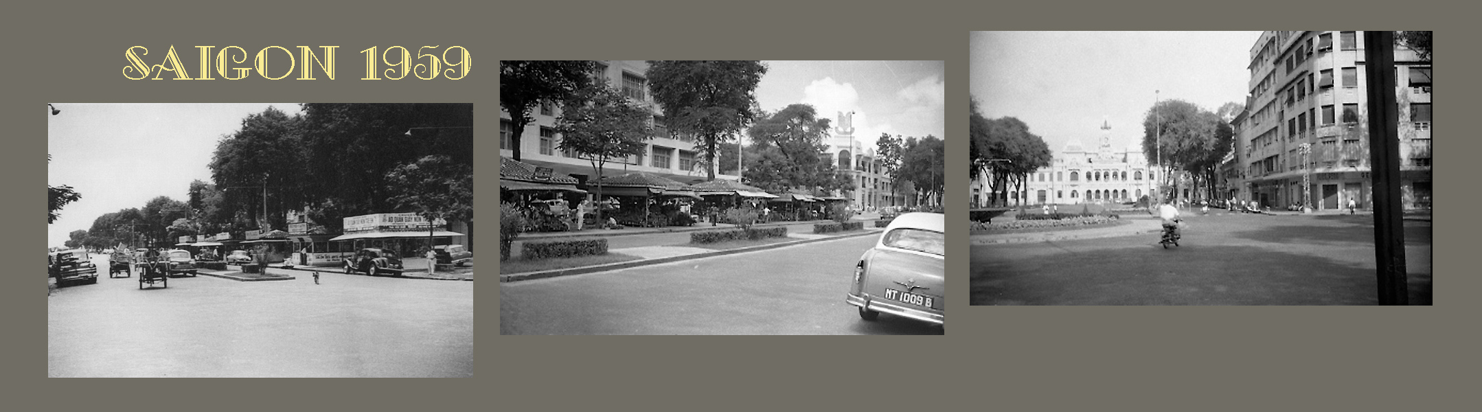 black and white image of a city with cars