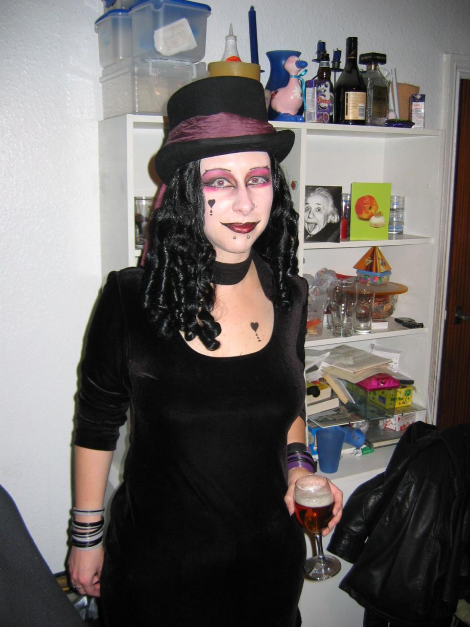 a person is dressed as a zombie with hair and makeup on