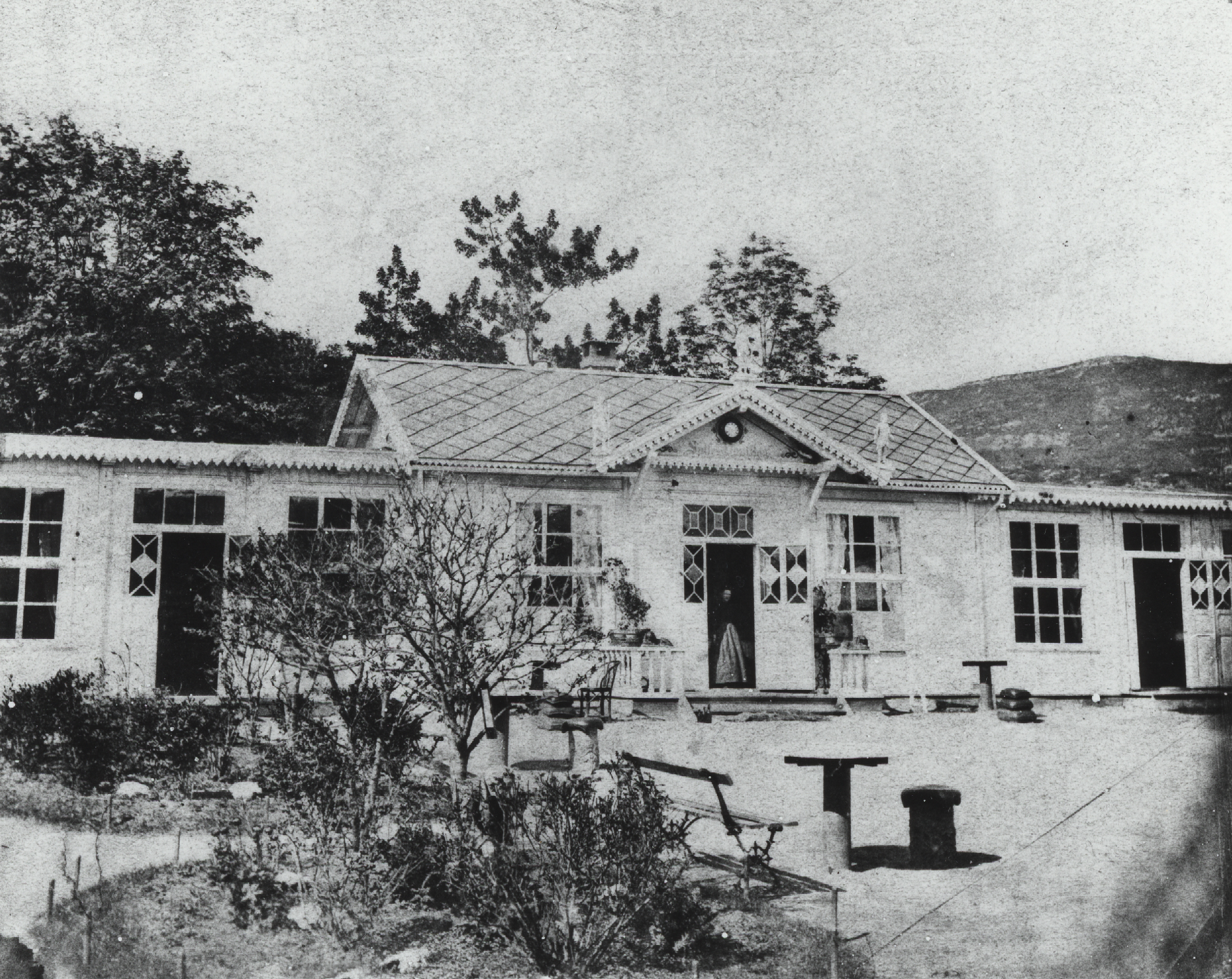 old black and white po of a building with several windows