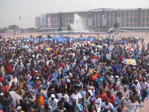 a large crowd of people at an event outside