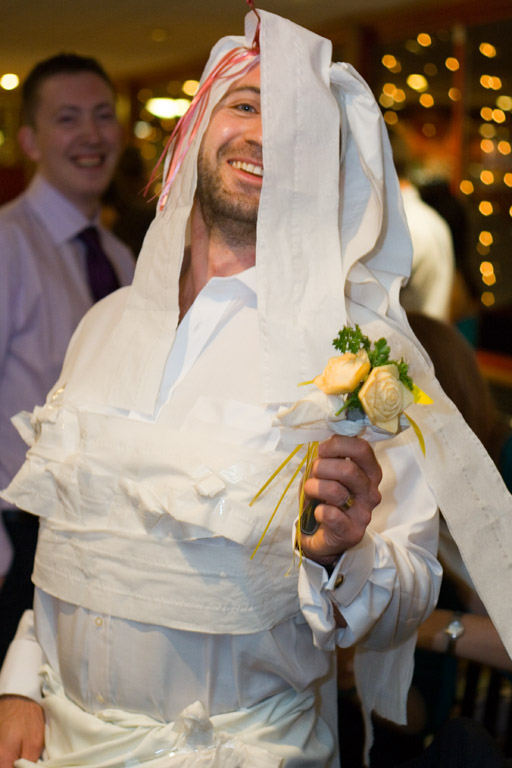 man in a costume with a towel on his head