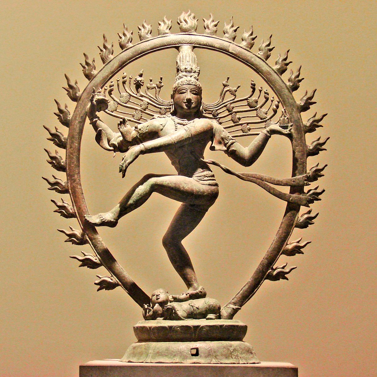 a statue in the shape of a dancing man