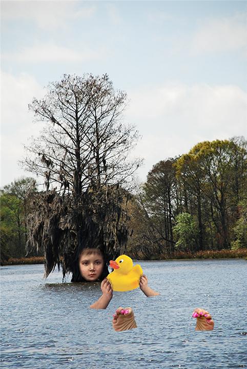 a man holding an inflatable rubber duck in the water