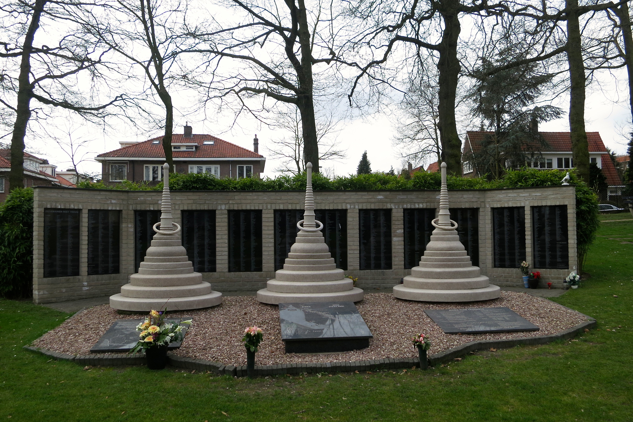 a building with three large concrete cones next to each other