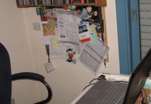 the interior of a small room with a laptop computer