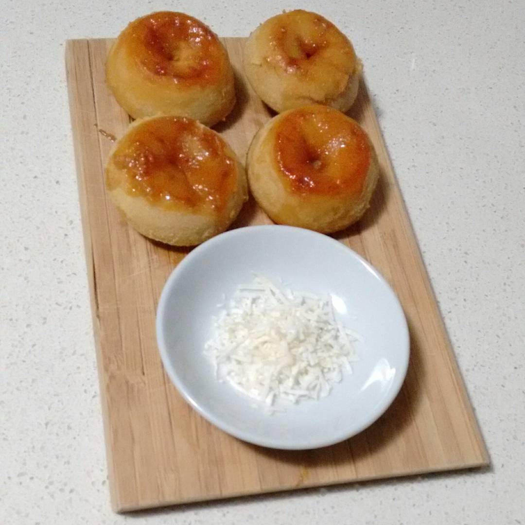 food sitting on a wood  board with white rice