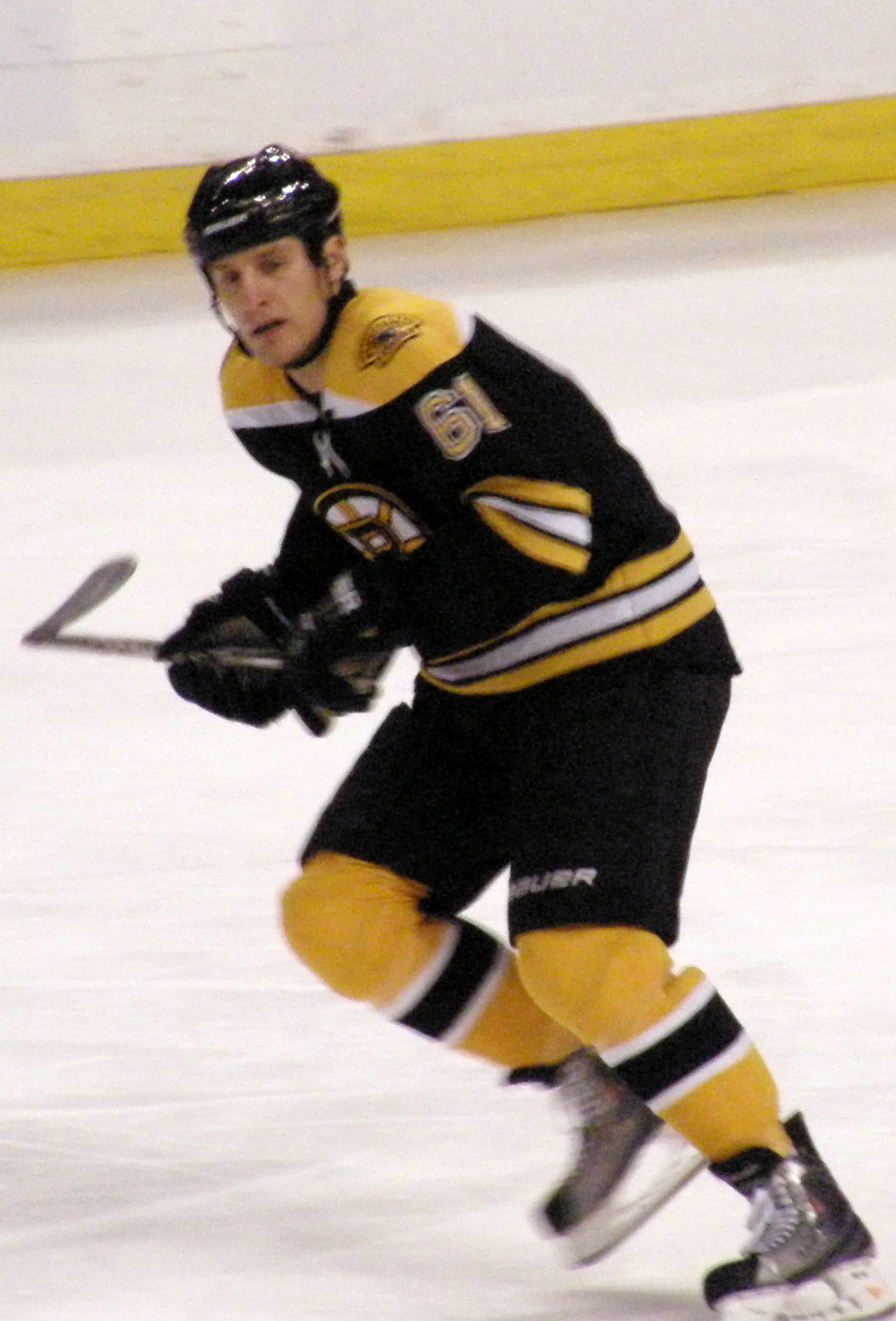 a hockey player in action on the ice
