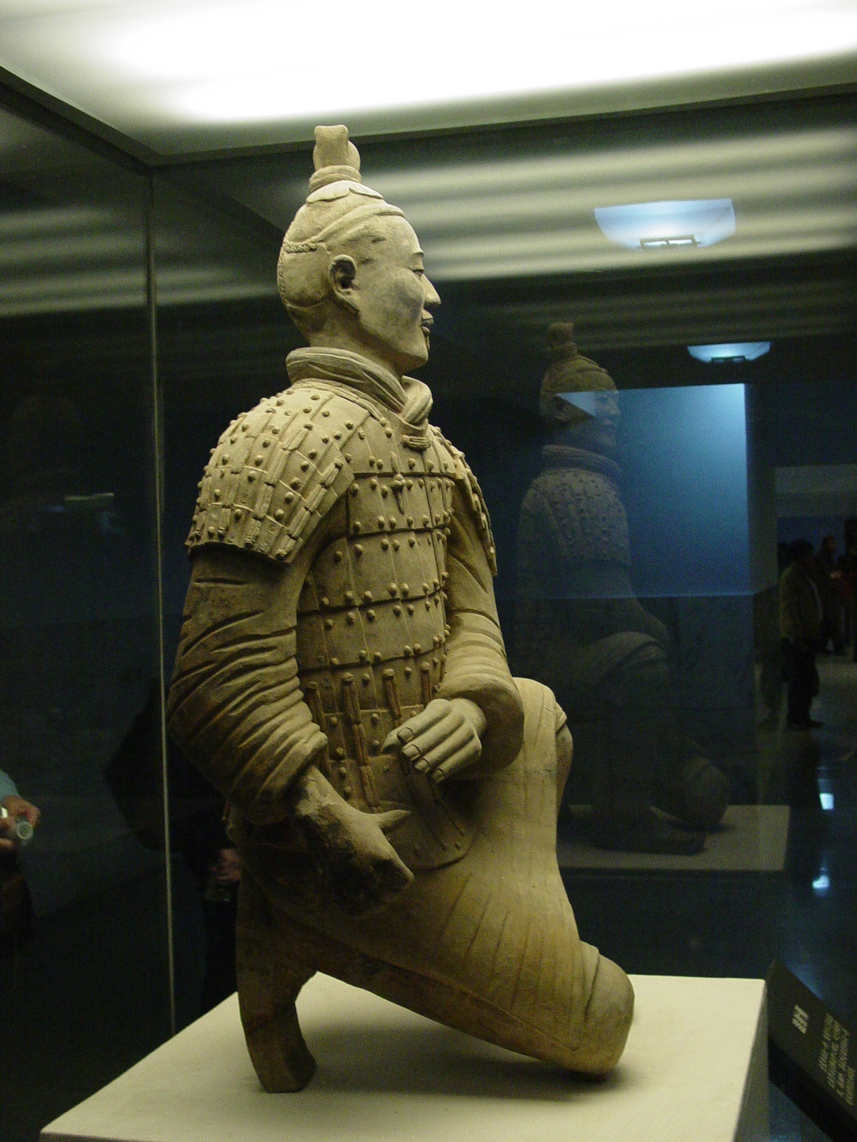 an oriental warrior like statue is on display