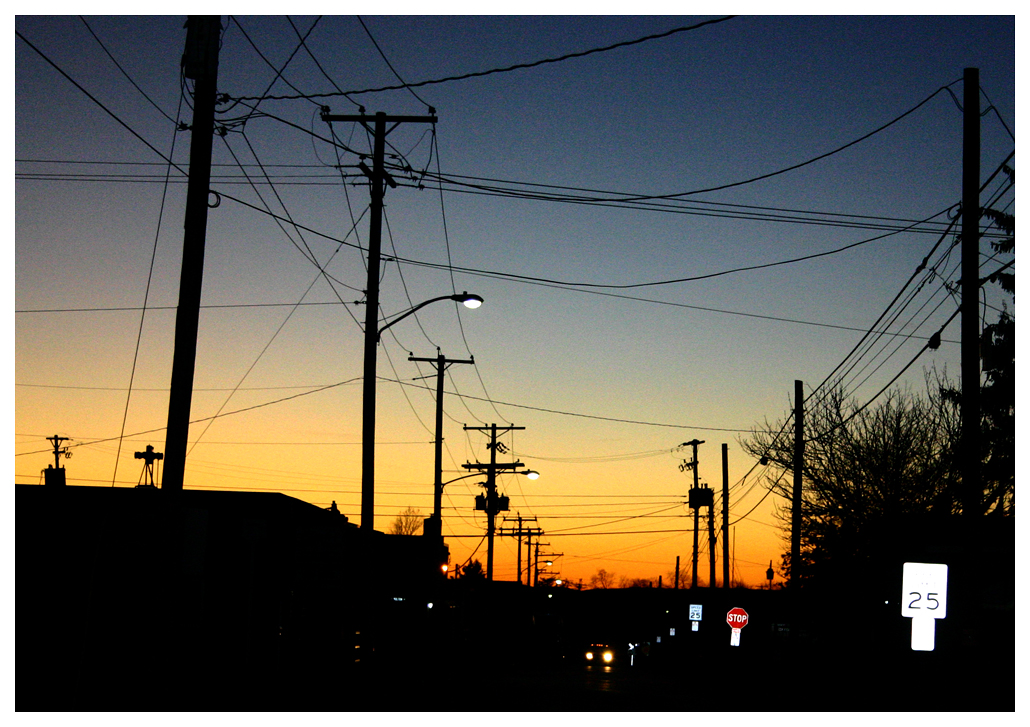 an image of a city skyline at sunset