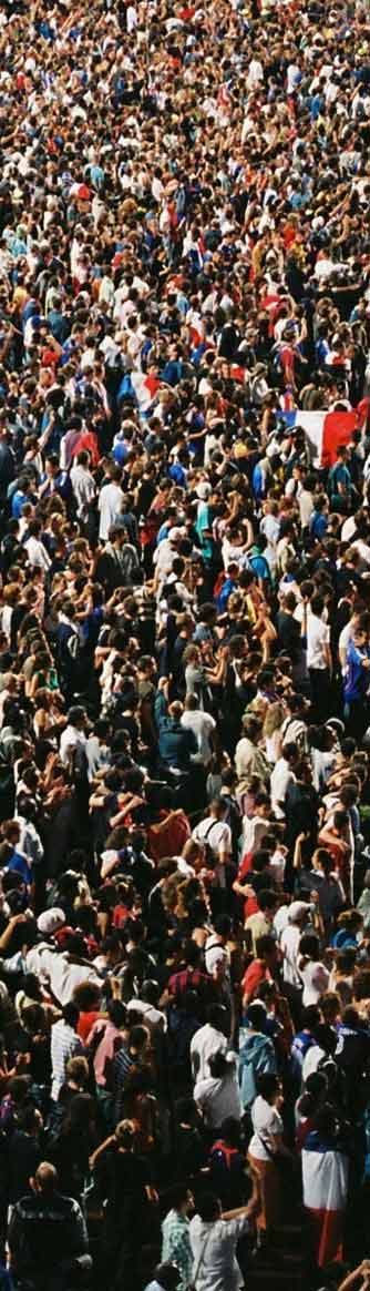 a large group of people are standing together