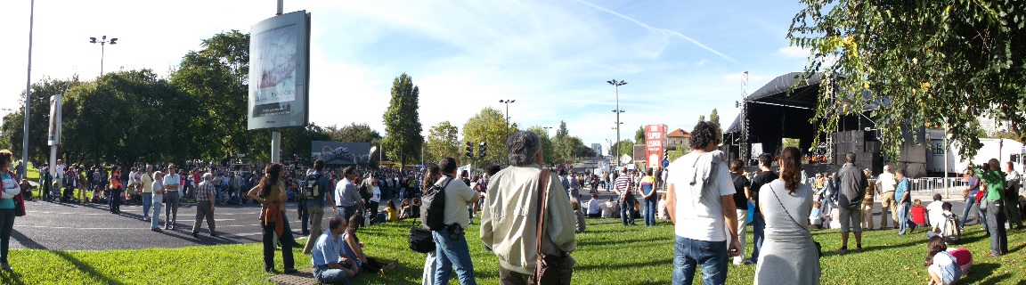 a crowd of people standing next to each other