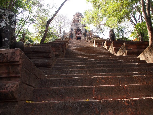 a stone staircase leading up into a cemetery