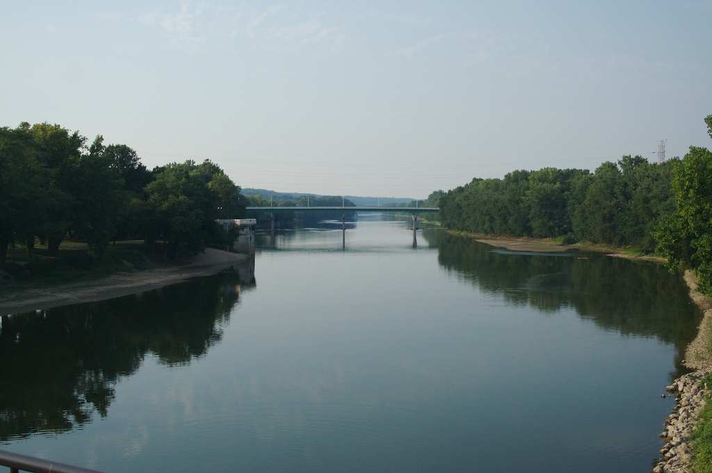 the river running through a city with bridges