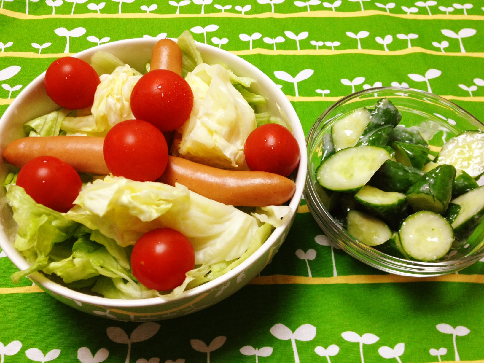 a couple of bowls filled with different types of vegetables