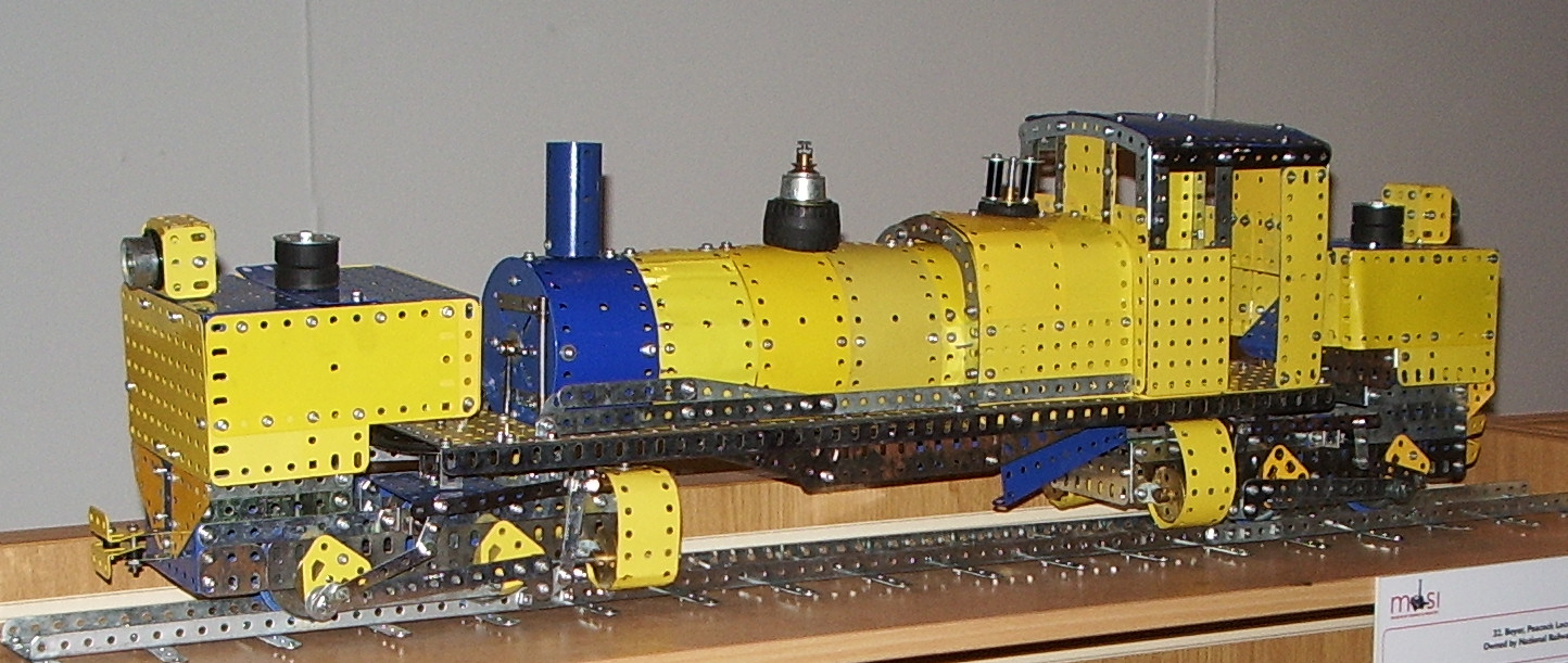 this is a model of an old yellow train on display