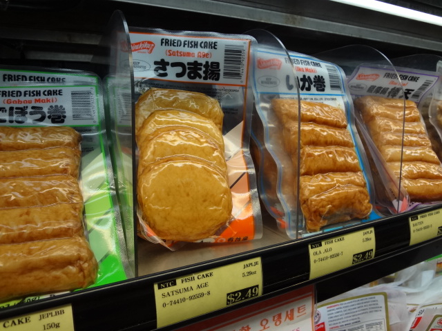 several packaged food items on display in a store