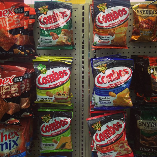a pile of chips sitting next to each other on a shelf