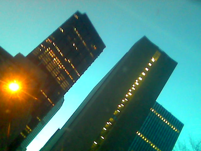 a couple of tall buildings that are next to each other