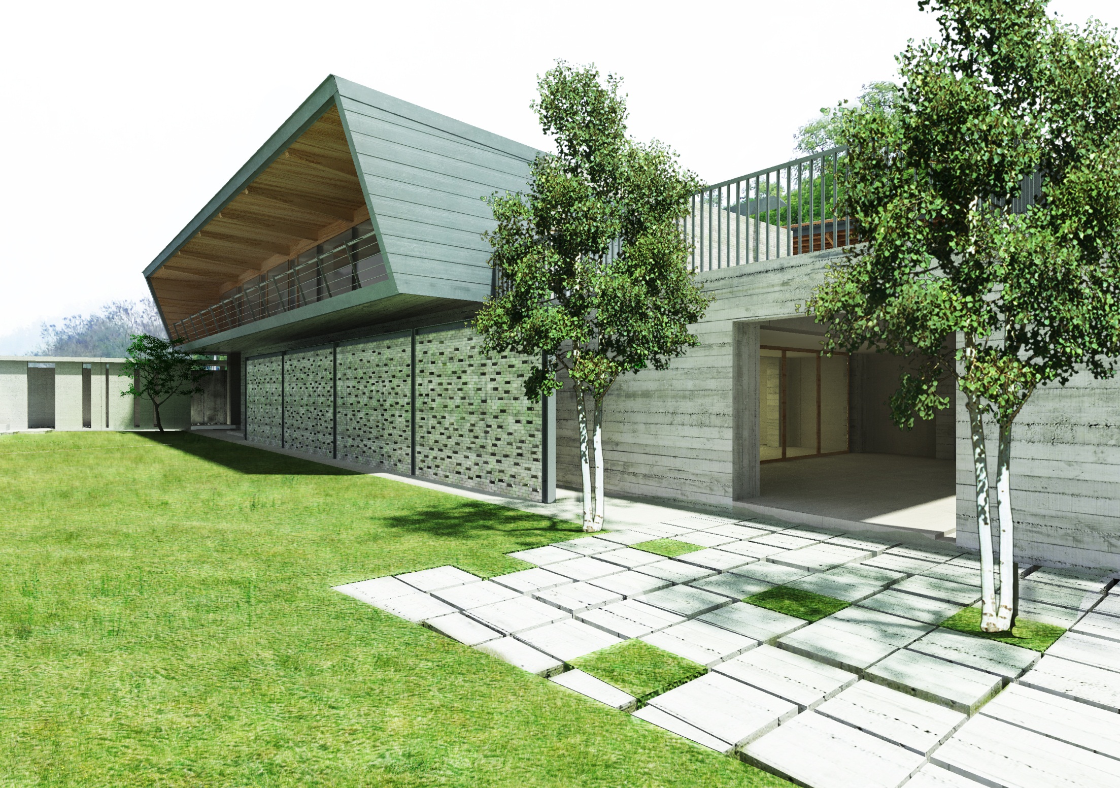 the green grass area is covered with paving, a row of trees and white brick buildings