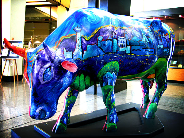 there is a bull painted in bright colors