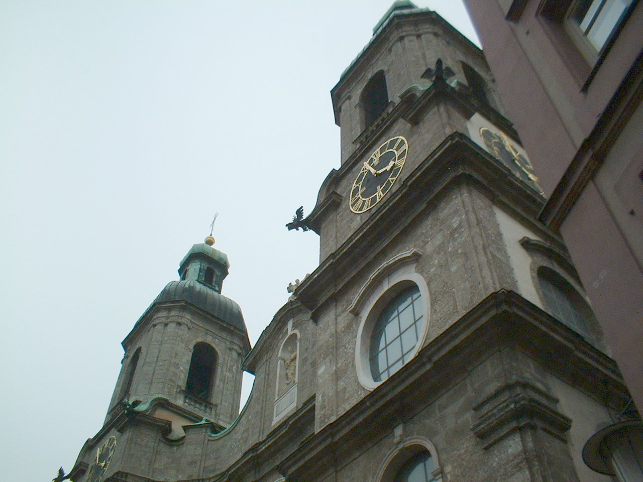 a church steeple with clocks on each side