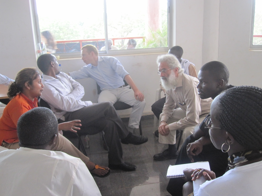 a group of people in a room together