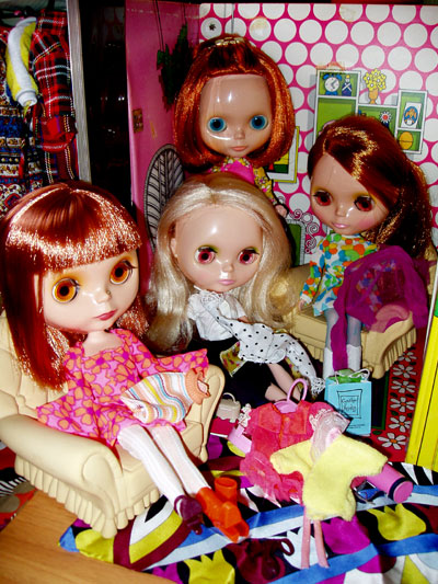 many dolls sit on the table with each other