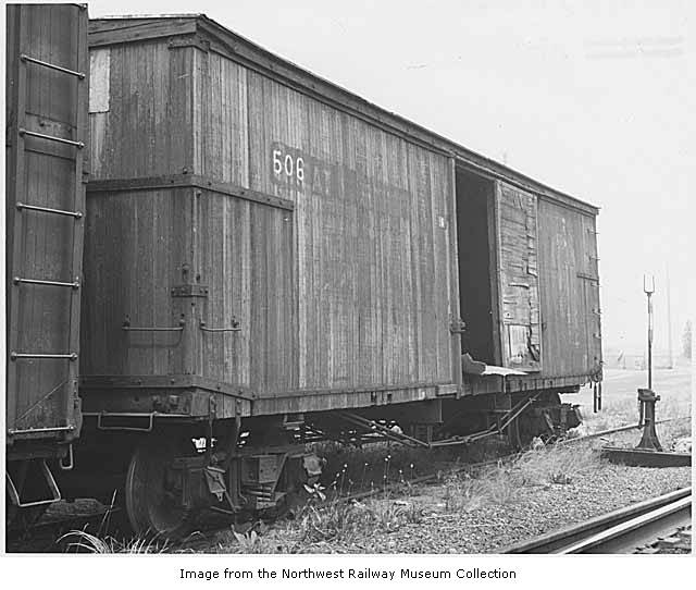 an old pograph of a train car in black and white
