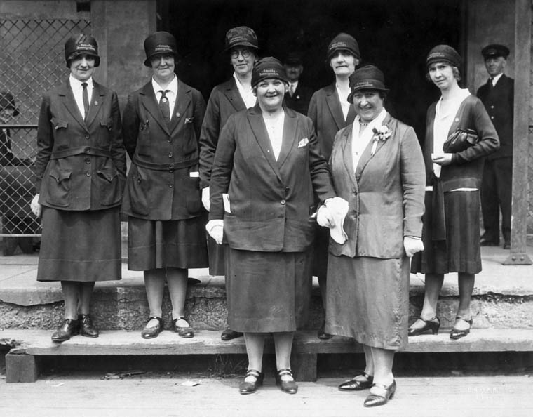 an old po of women wearing hats and dresses