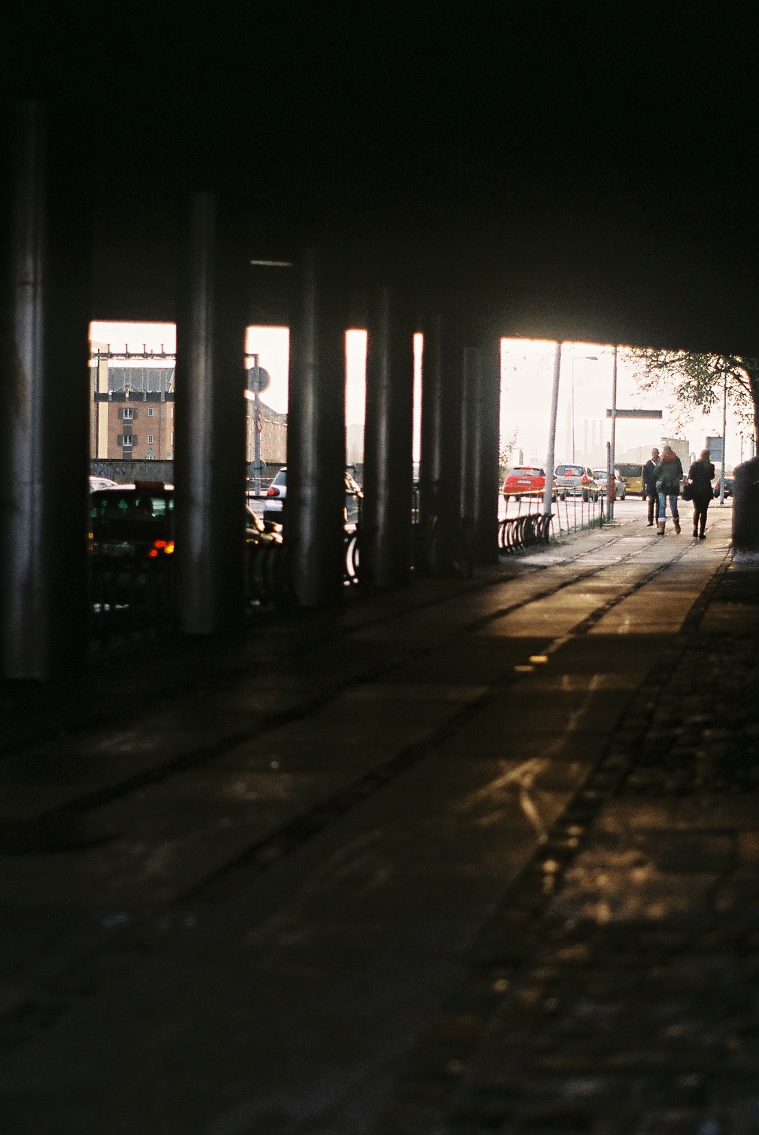 the people are walking together in the dark