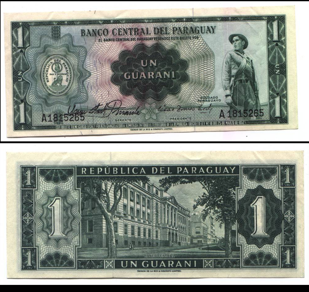 two old currency notes on display in front of each other